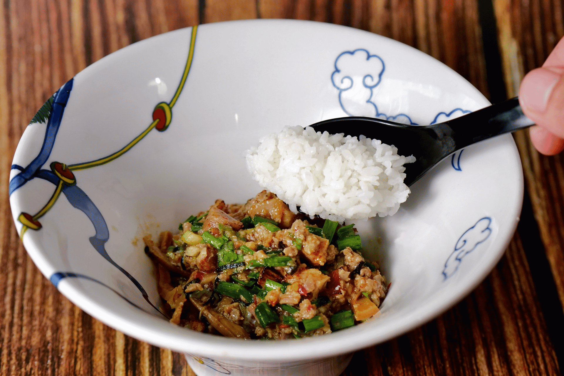 Rice added to the remaining sauce and toppings after the noodles are finished — oimeshi, the chaser rice for RAMEN RAIJIN Spicy Taiwanese Mazesoba