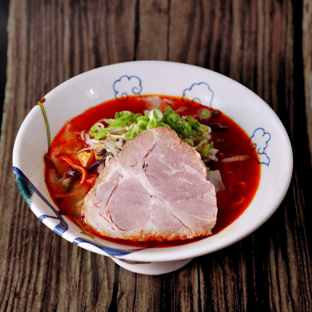 A finished bowl of RAMEN RAIJIN Frozen Spicy Shio Tanmen with RAIJIN chili oil, ichimi and cayenne pepper